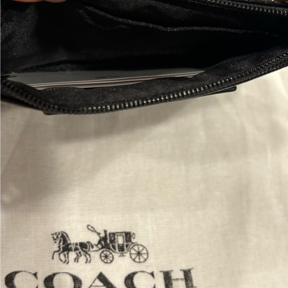 Coach Poppy NWT Black Patent Leather Wristlet w/ Gold-tone graphic patch - Picture 4 of 6
